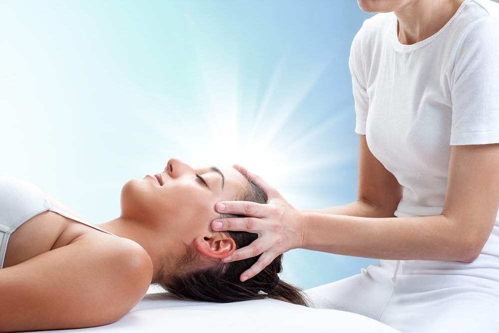 Conceptual osteopathic healing with light glow.